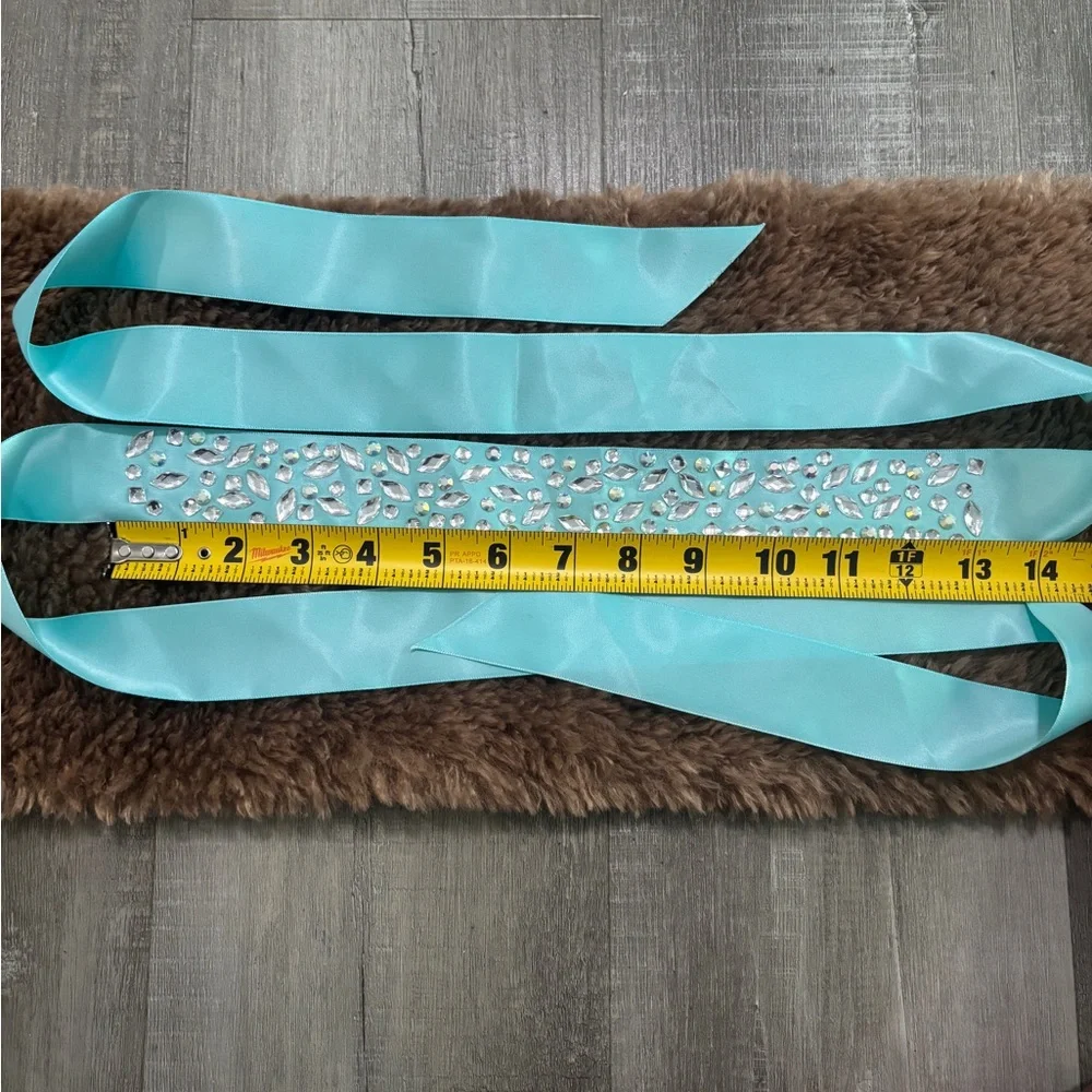 Elegant Turquoise Sash with Rhinestone Detailing